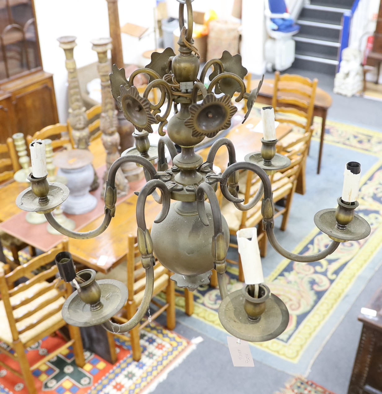 A cast brass six branch electrolier, 45cms high.